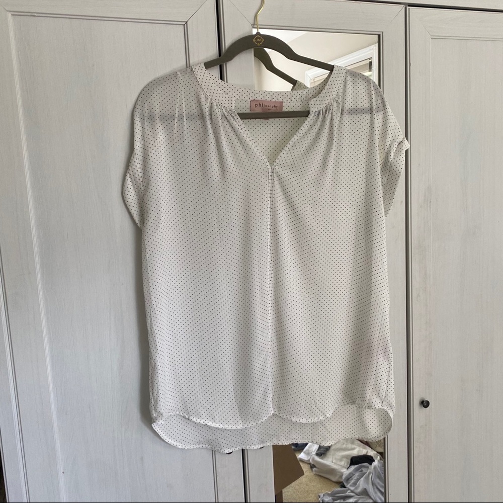 White and black polka dot blouse